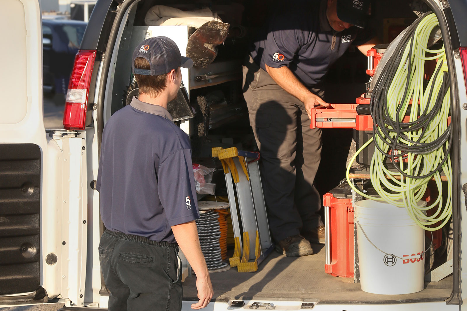 Residential electrician in London Ontario organizing service van