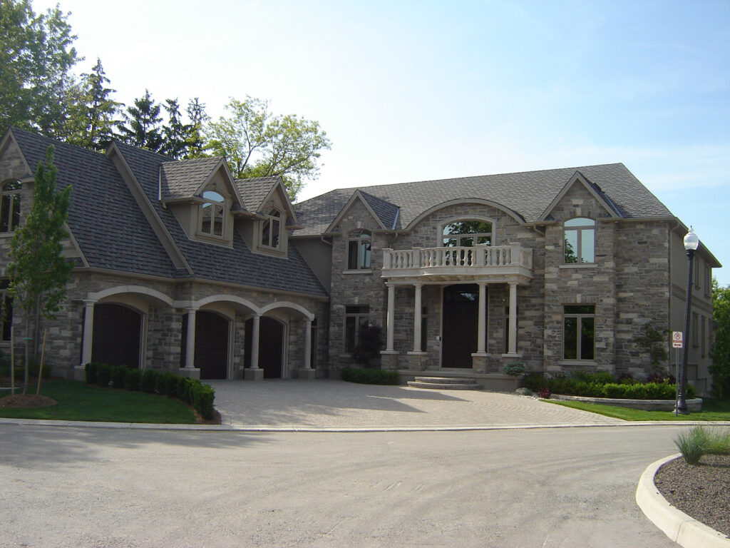 Luxury custom home exterior with outdoor lighting by G&S Electric in London, Ontario